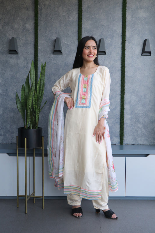 chic muslin dress with a printed dupatta and intricate neck panel work