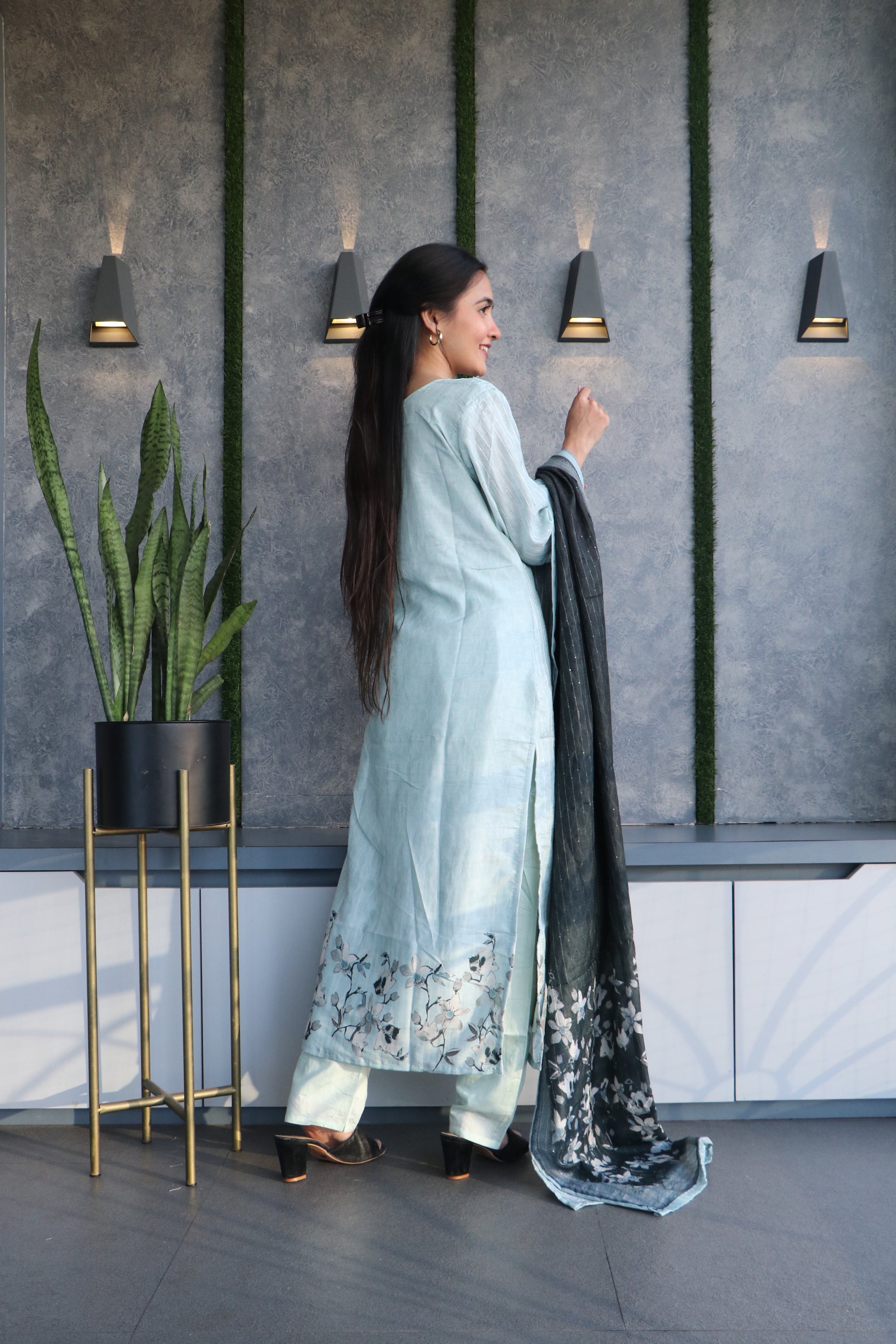 intricate zari, jardosi, and bead work adorn the kurta set, creating a captivating pattern